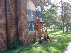 Keith painting convent porch.